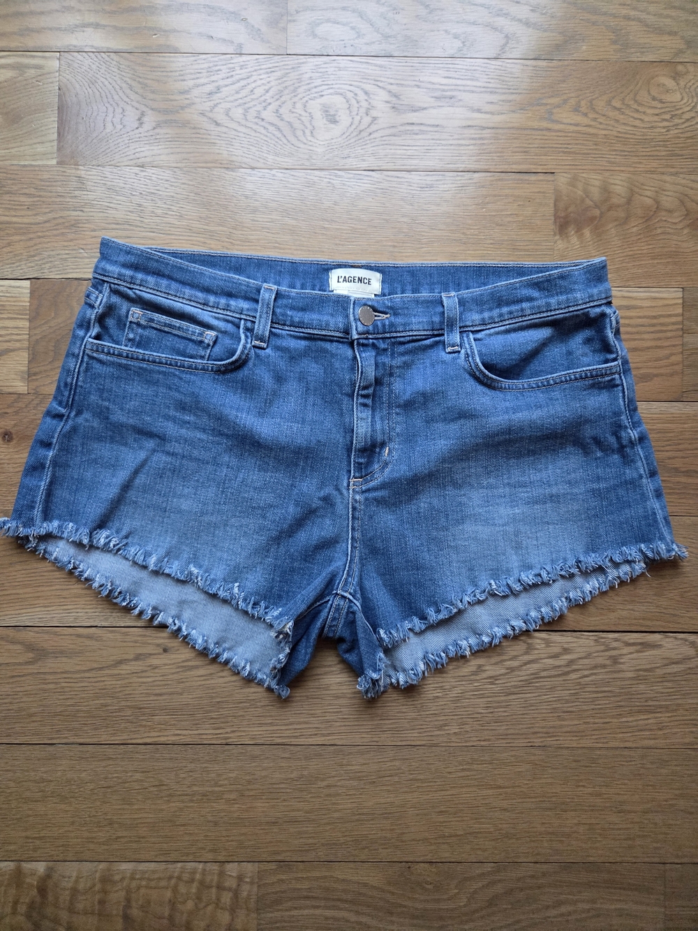L'AGENCE Audrey Medium Blue Frayed Hem Denim Shorts